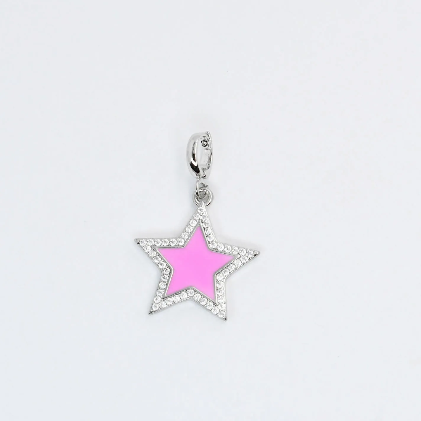 Silver Pink Star Charm sold by Charming Charlie