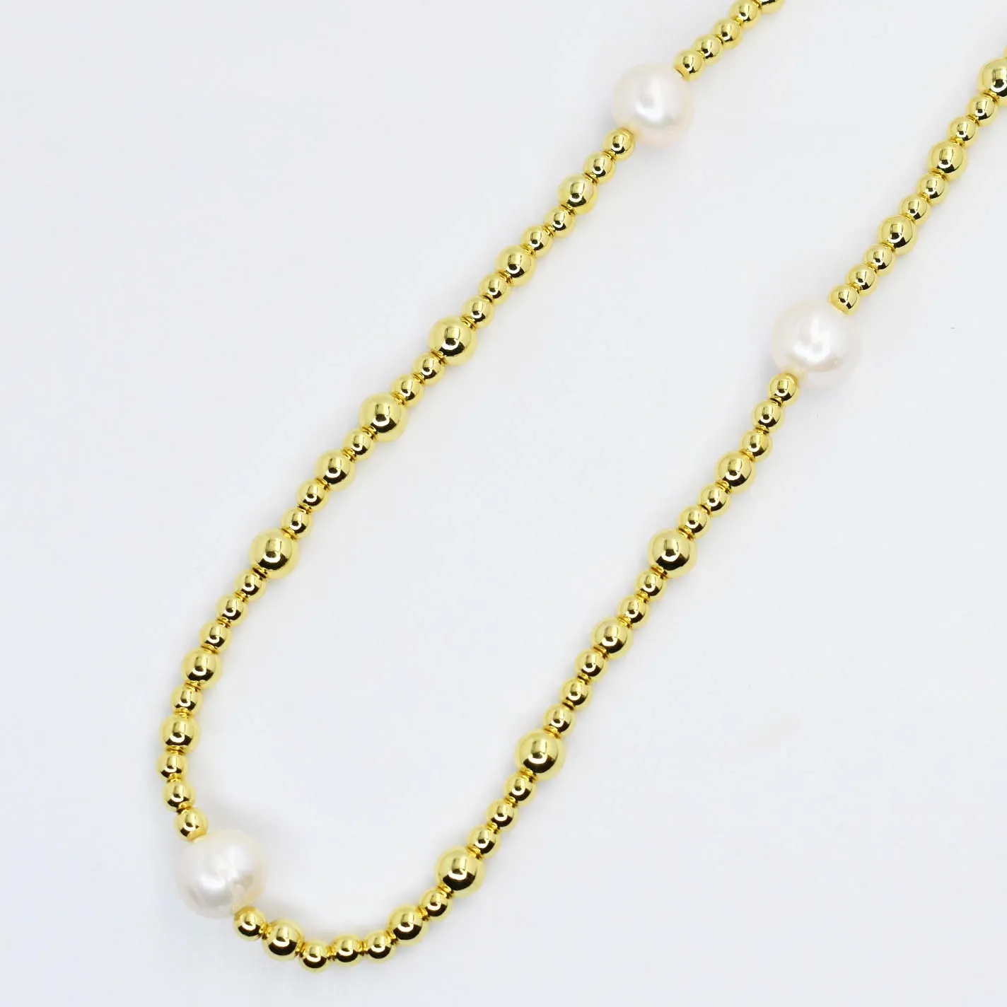 Gold Beaded Necklace With 3 Pearls sold by Charming Charlie