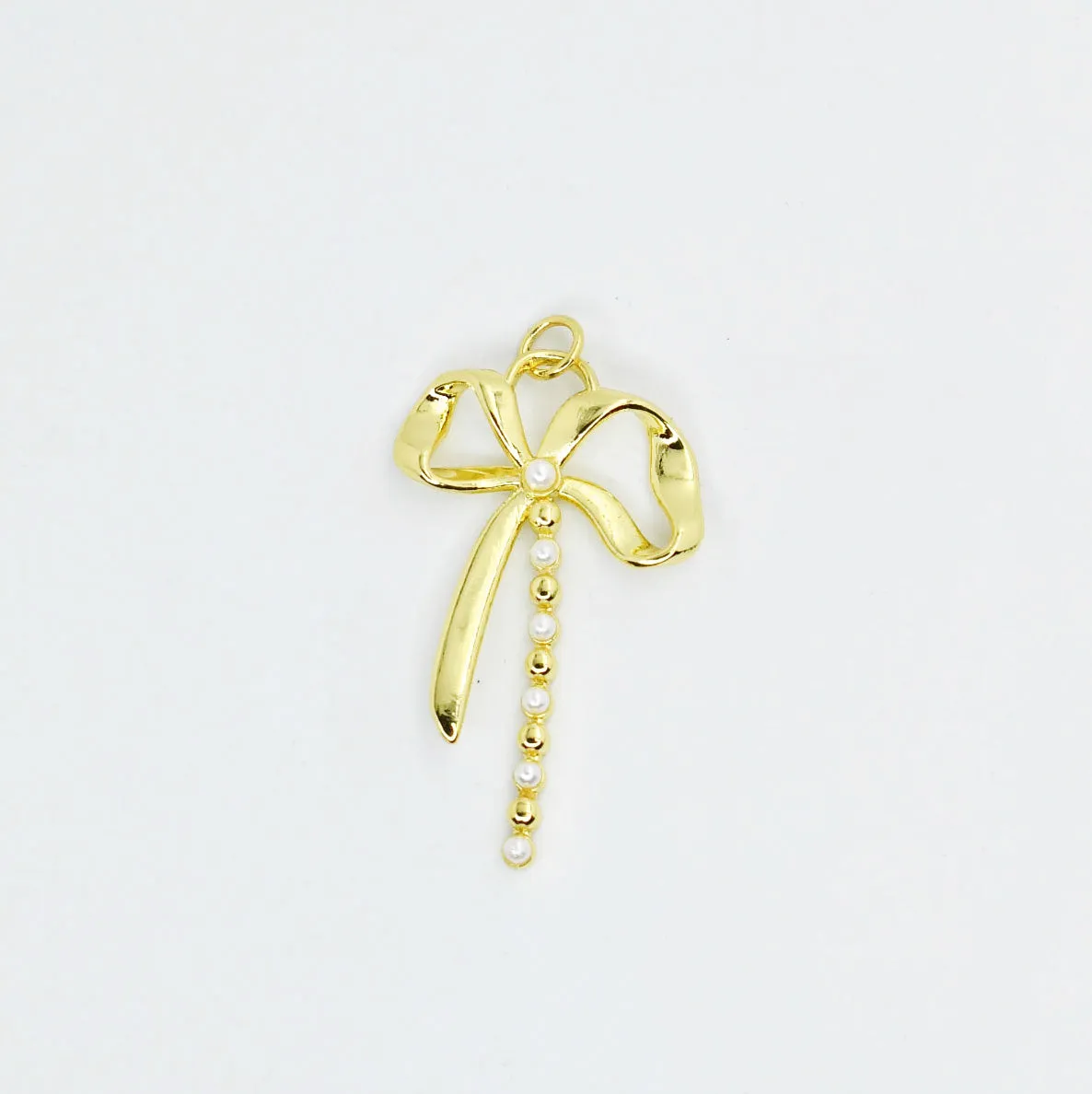 Pearly Bowknot Charm CH-31 sold by Charming Charlie