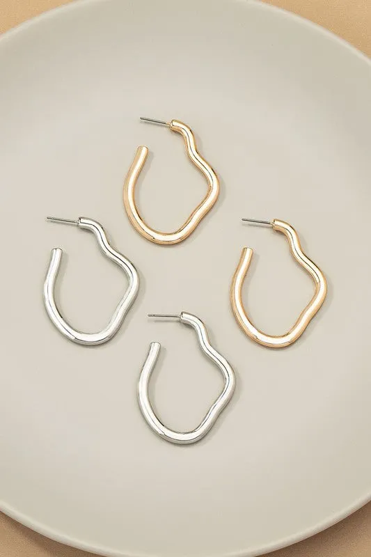 Irregular shape metal hoop earrings sold by Charming Charlie product image thumbnail 3