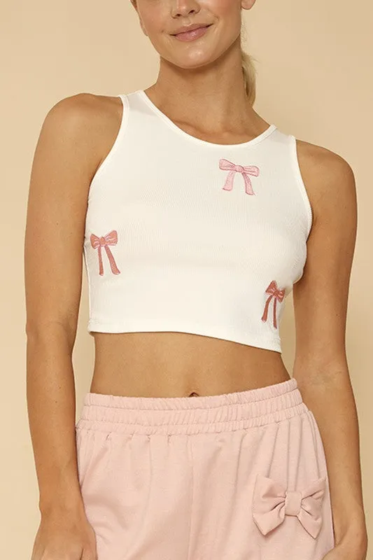 Ribbed knit bow embroidered tank sold by Charming Charlie
