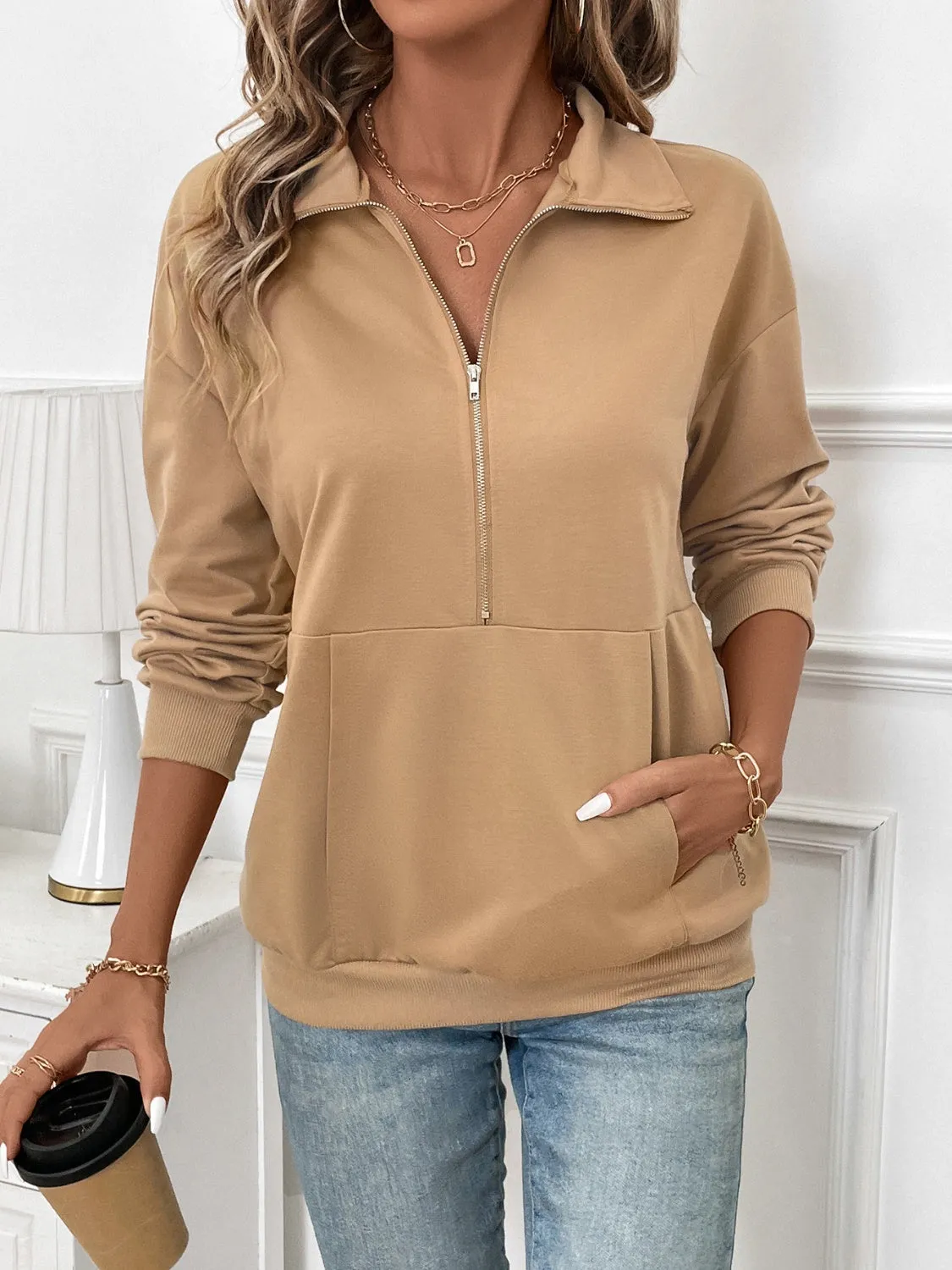 Half Zip Kangaroo Pocket Long Sleeve Sweatshirt sold by Charming Charlie