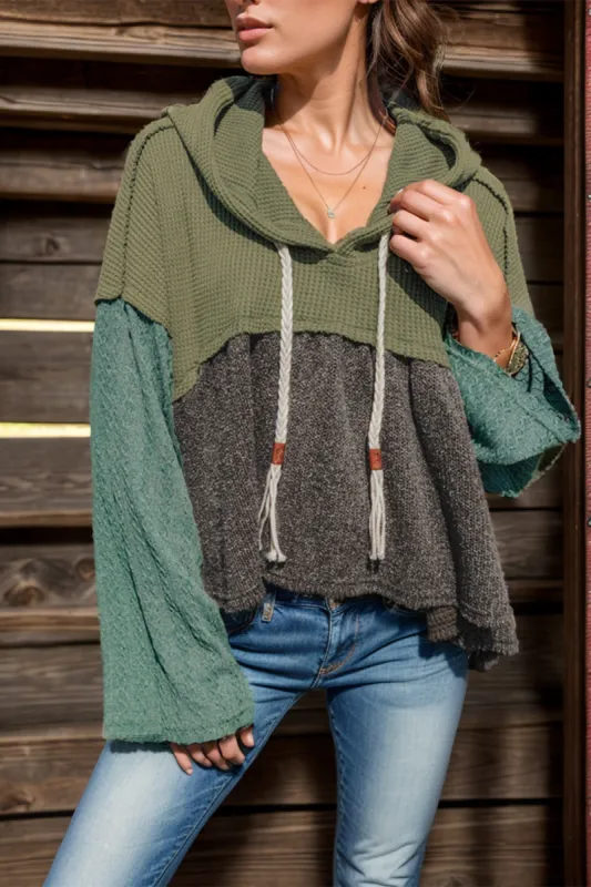 Waffle-Knit High-Low Color Block Hooded Long Sleeve Top sold by Charming Charlie