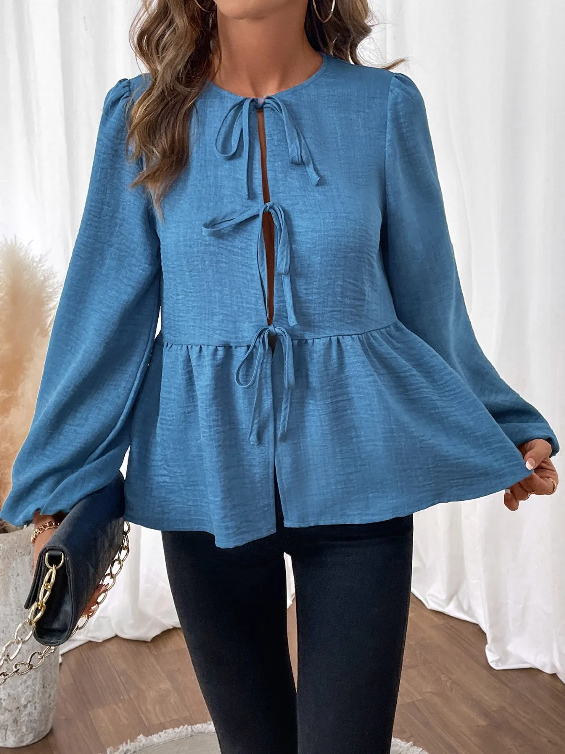 Peplum Tie Neck Balloon Sleeve Blouse sold by Charming Charlie product image thumbnail 3