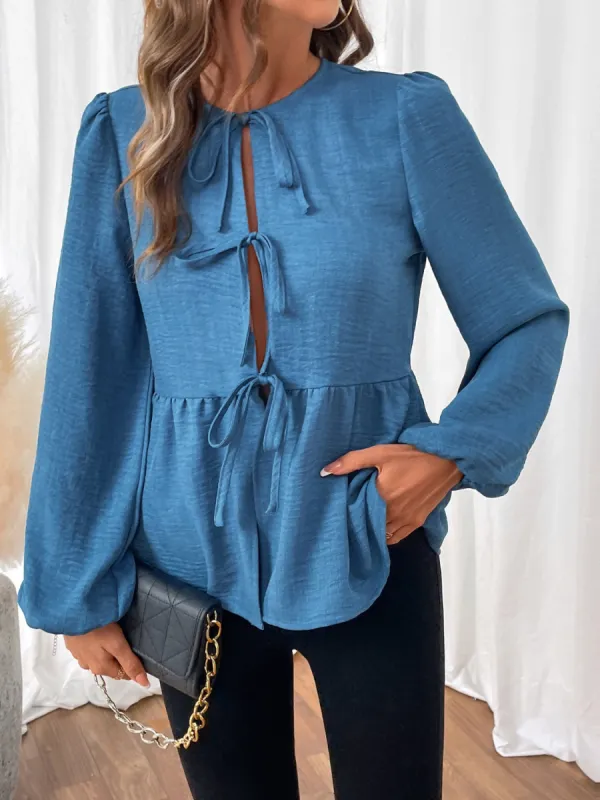 Peplum Tie Neck Balloon Sleeve Blouse sold by Charming Charlie