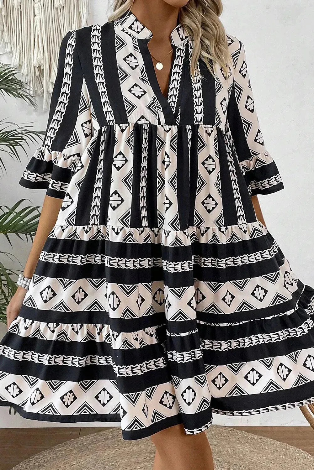 Tiered Printed Notched Half Sleeve Dress sold by Charming Charlie