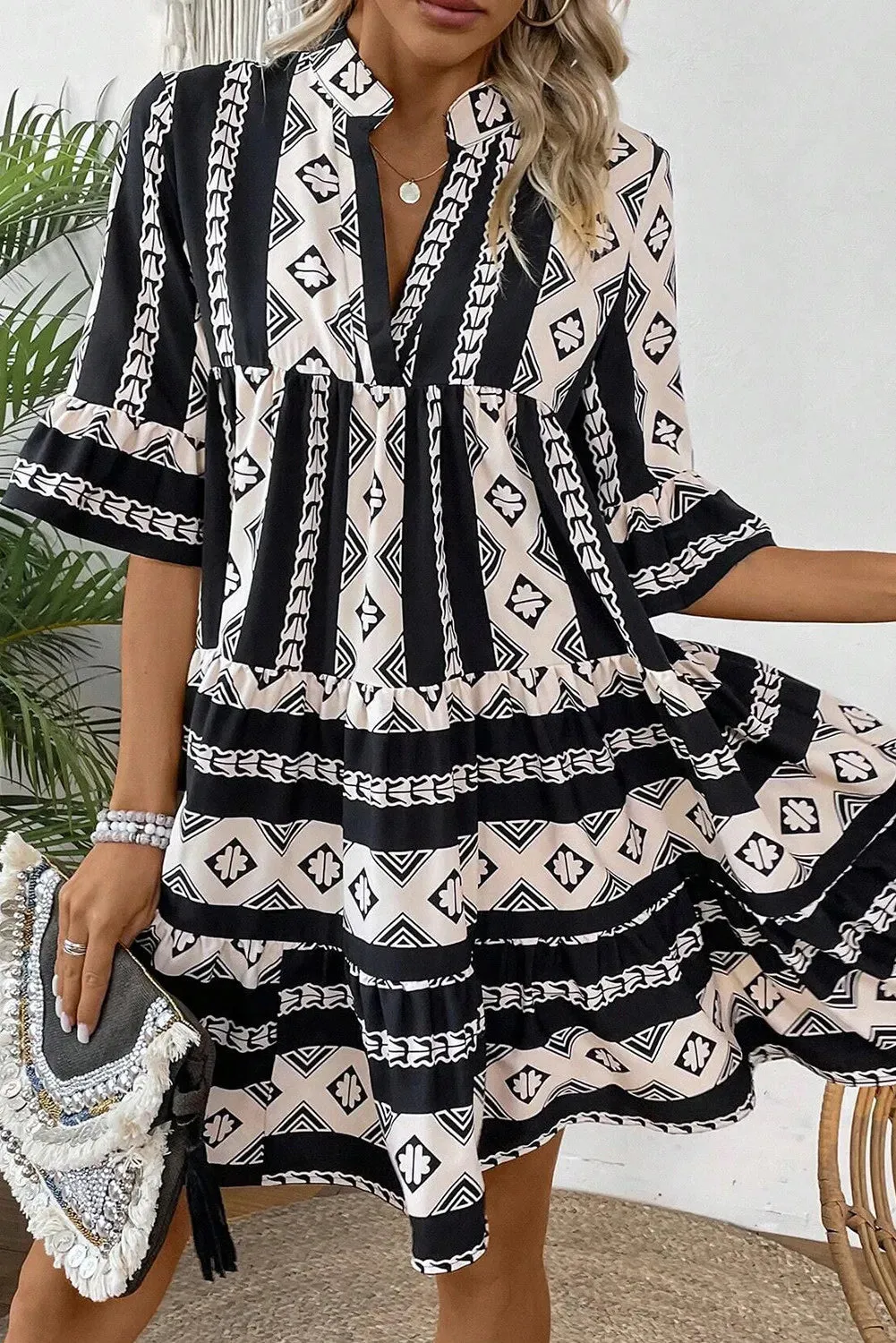 Tiered Printed Notched Half Sleeve Dress sold by Charming Charlie product image thumbnail 2