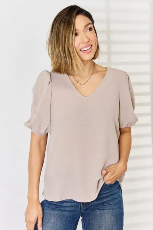 Zenana V-Neck Puff Sleeve Top sold by Charming Charlie