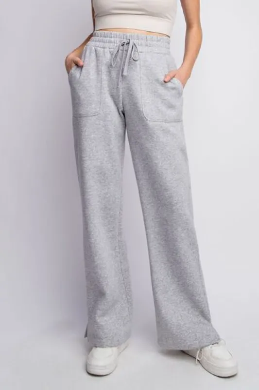 Faith Apparel Full Size Drawstring Straight Leg Slit Sweatpants sold by Charming Charlie