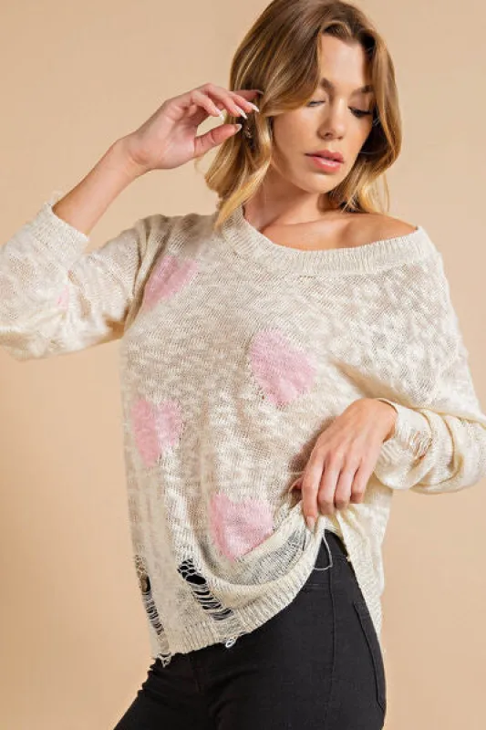 Kori America Heart Pattern Distressed Sweater sold by Charming Charlie