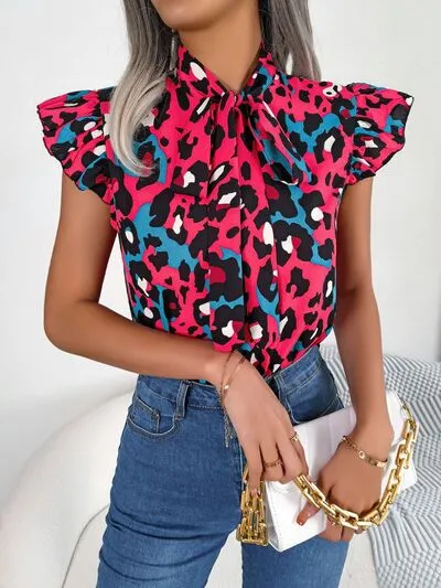 Leopard Tie Neck Cap Sleeve Blouse sold by Charming Charlie product image thumbnail 5