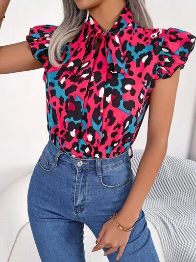 Leopard Tie Neck Cap Sleeve Blouse sold by Charming Charlie product image thumbnail 3