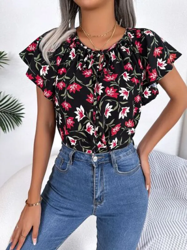 Floral Tie Neck Flutter Sleeve Blouse sold by Charming Charlie