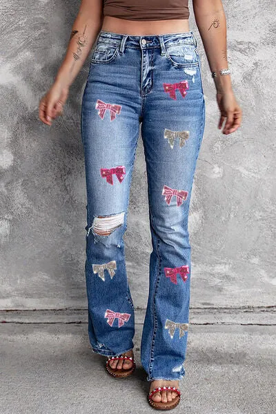 Sequin Bow Distressed Bootcut Jeans sold by Charming Charlie