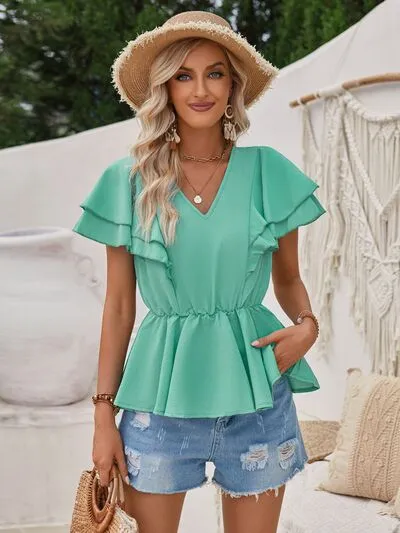 Ruffled V-Neck Peplum Blouse sold by Charming Charlie