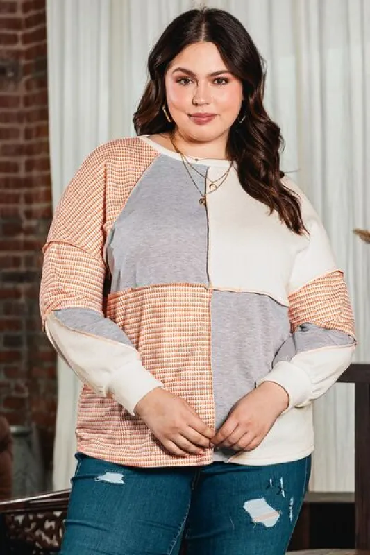 Plus Size Exposed Seam Color Block Round Neck Sweatshirt sold by Charming Charlie