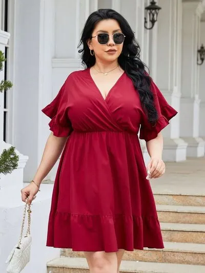 Plus Size Ruched Surplice Flounce Sleeve Mini Dress sold by Charming Charlie