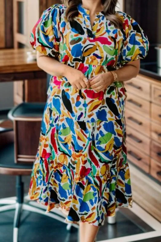 Plus Size Notched Short Sleeve Tiered Dress sold by Charming Charlie