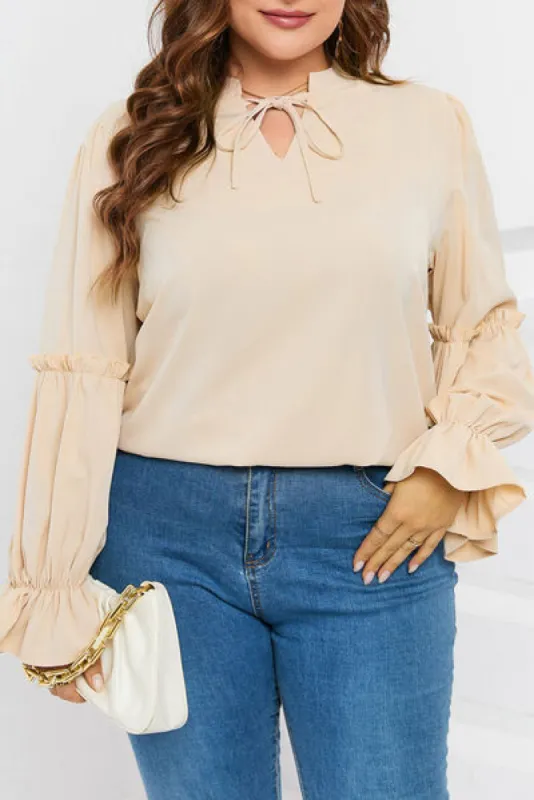 Plus Size Ruffled Tie Neck Flounce Sleeve Blouse sold by Charming Charlie