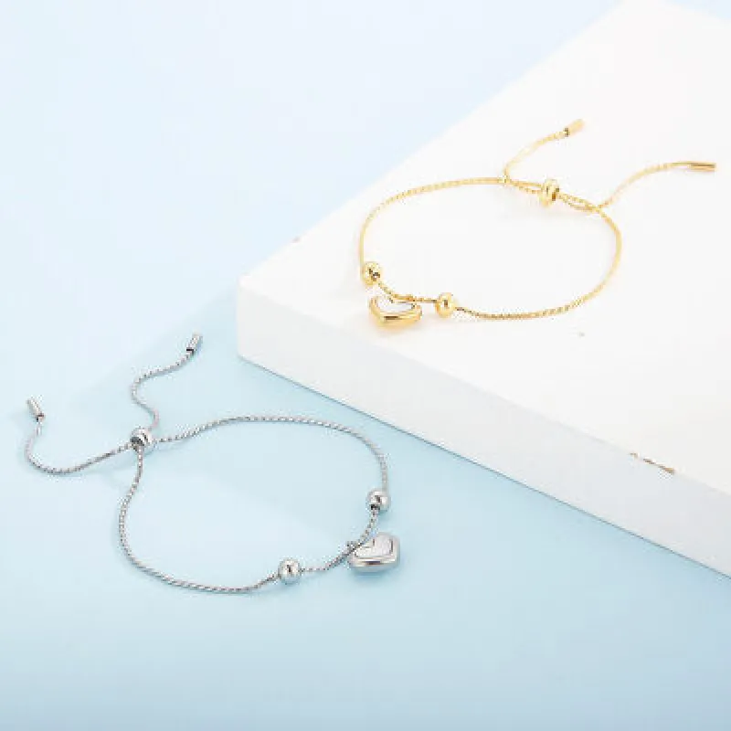 Mother-Of-Pearl Heart Pendant Stainless Steel Bracelet sold by Charming Charlie