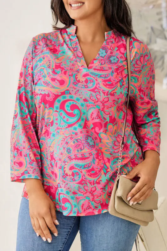 Plus Size Printed Notched Long Sleeve Blouse sold by Charming Charlie