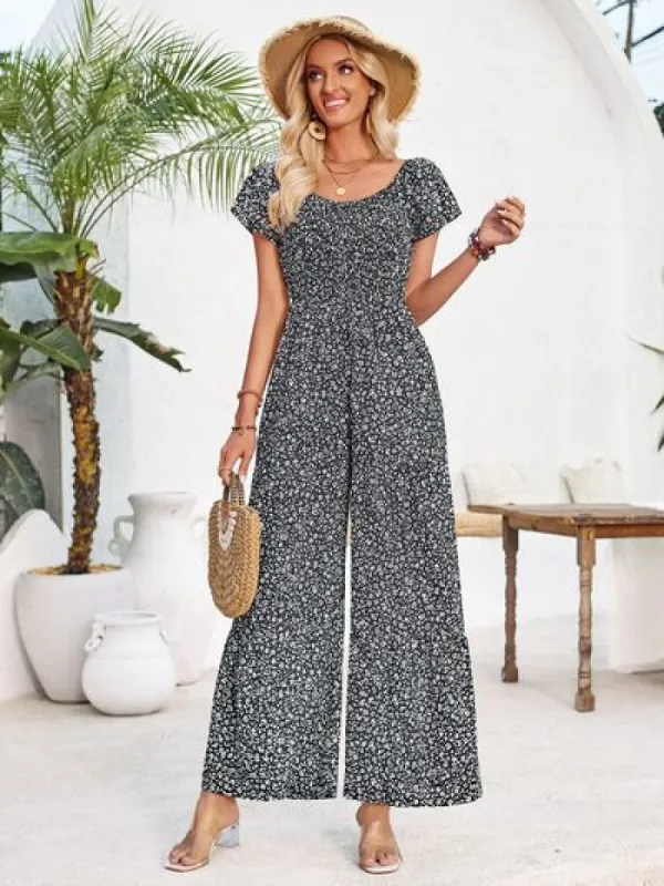 Smocked Printed Short Sleeve Jumpsuit sold by Charming Charlie