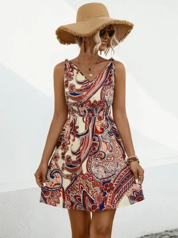 Smocked Printed V-Neck Mini Dress sold by Charming Charlie