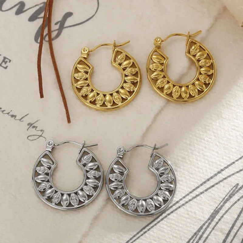 Stainless Steel Cutout Leaf Shape Huggie Earrings sold by Charming Charlie