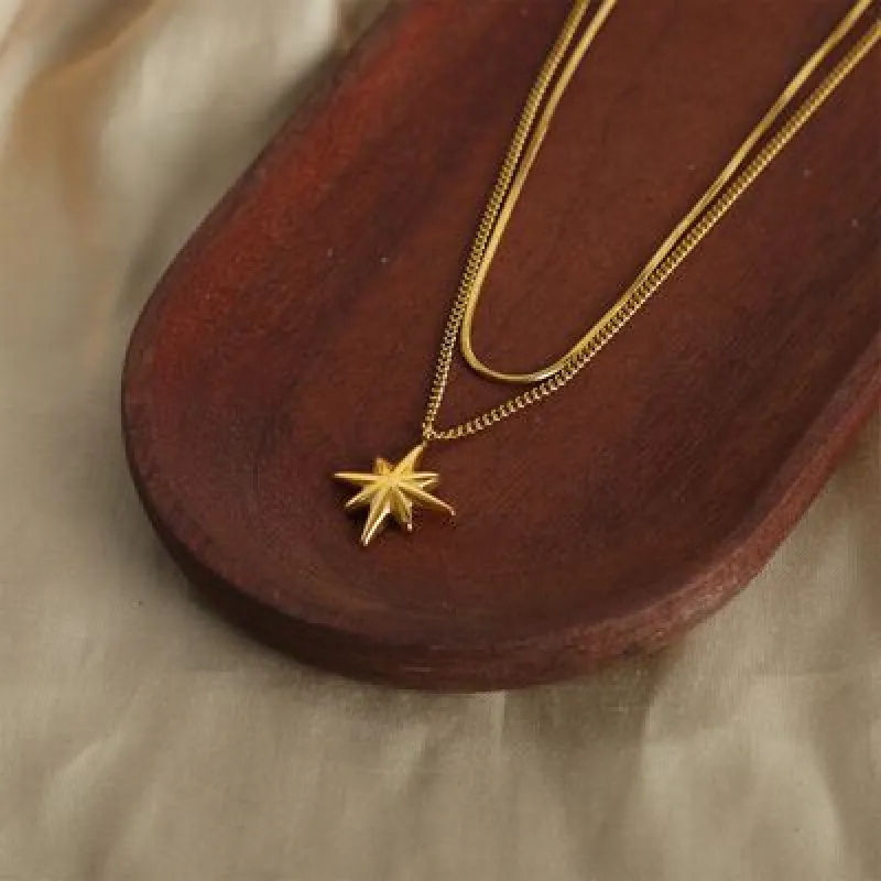Star Pendant Double-Layered Titanium Steel Necklace sold by Charming Charlie