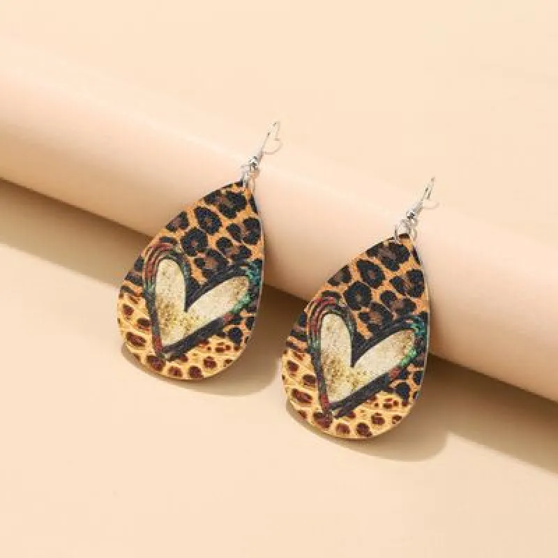 PU Leather Leopard Teardrop Earrings sold by Charming Charlie