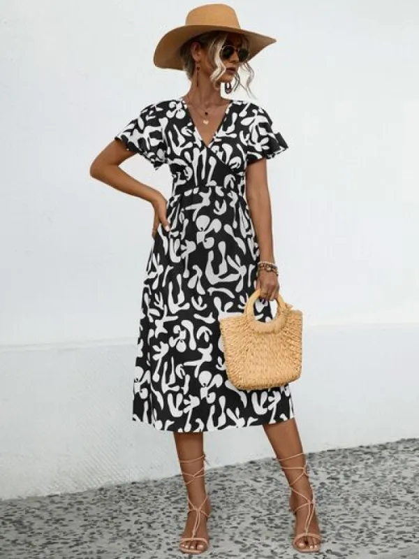 Printed V-Neck Short Sleeve Dress sold by Charming Charlie