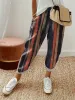 Striped Pocketed Elastic Waist Pants sold by Charming Charlie