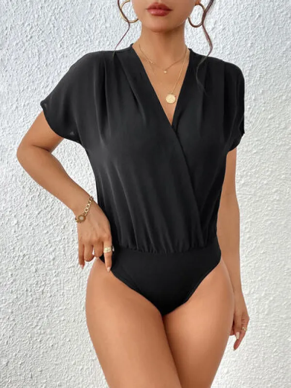 Surplice Short Sleeve Ruched Bodysuit sold by Charming Charlie