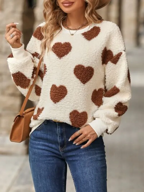 Fuzzy Heart Dropped Shoulder Sweatshirt sold by Charming Charlie