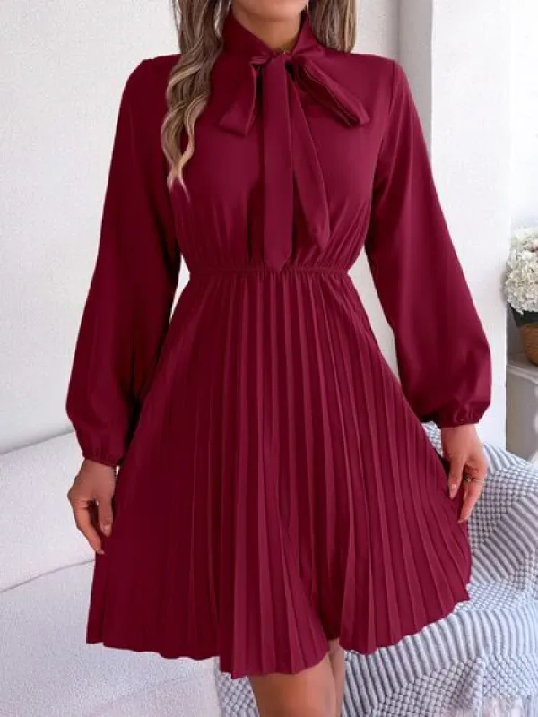Tie Neck Balloon Sleeve Pleated Dress sold by Charming Charlie
