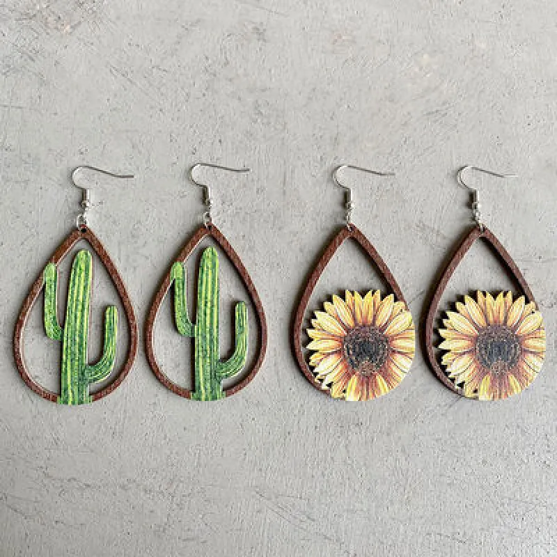 Hollowed Wooden Teardrop Earrings sold by Charming Charlie