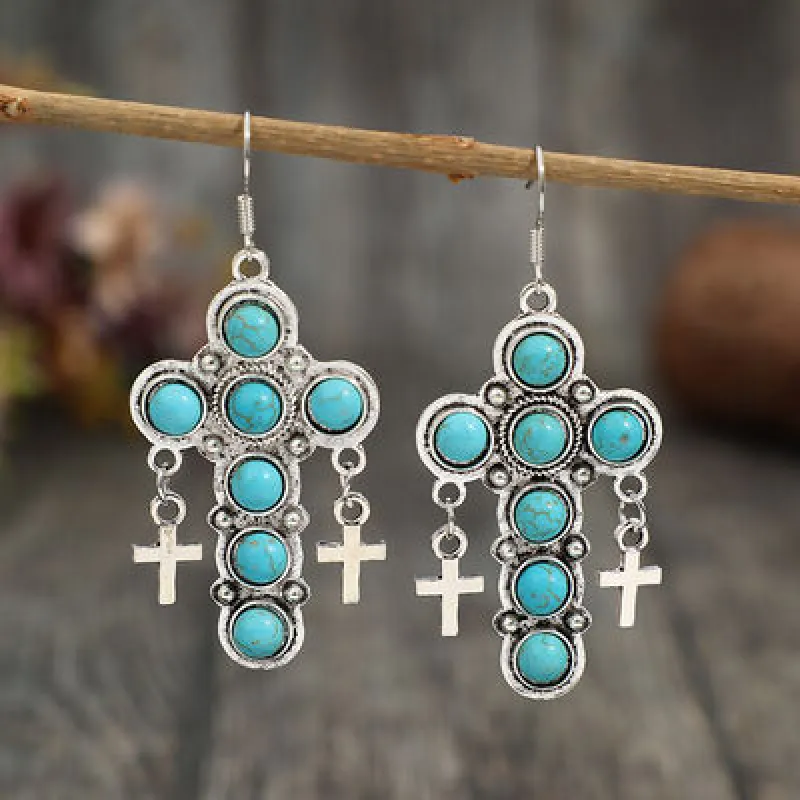 Artificial Turquoise Cross Shape Earrings sold by Charming Charlie