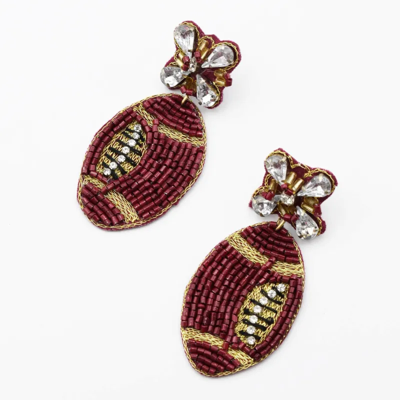 Football Maroon Beaded Earrings S30 sold by Charming Charlie