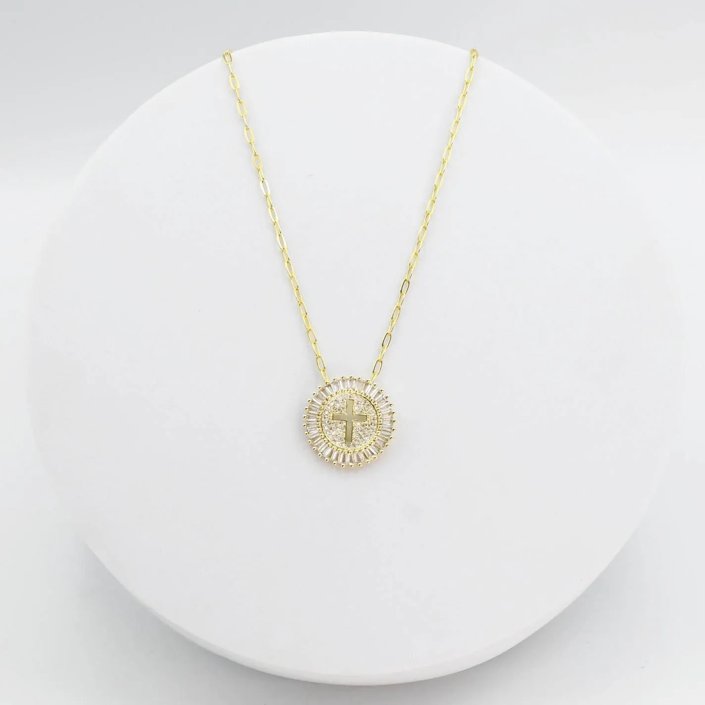 Grace cross Gold I-26 sold by Charming Charlie