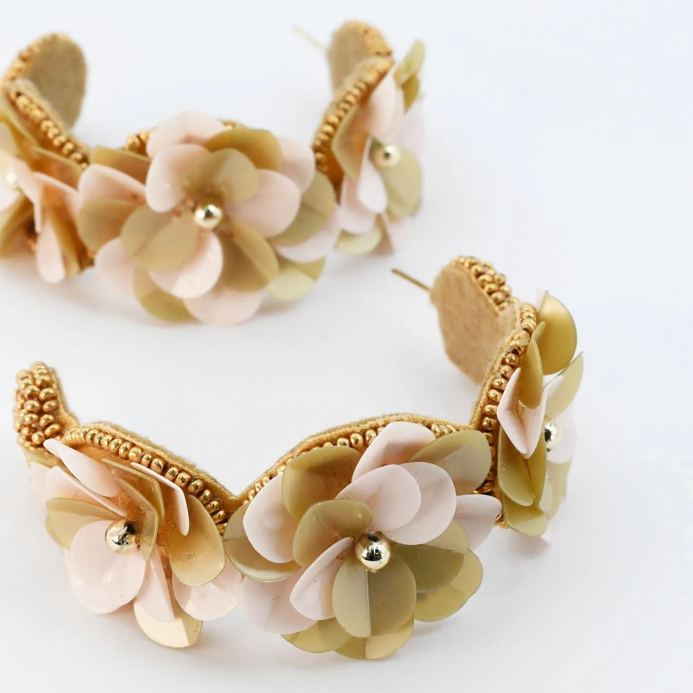 Multi Flower Hoop Rose D26 sold by Charming Charlie