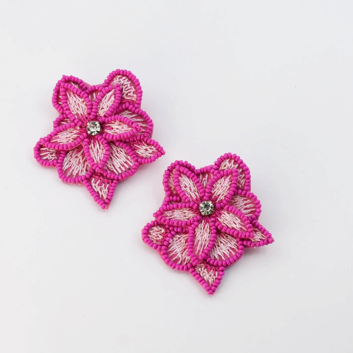 Pink Lotus D5 sold by Charming Charlie