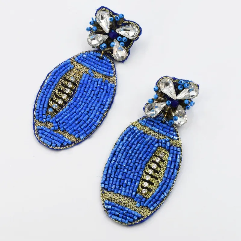 Turquoise Football Earring S35 sold by Charming Charlie