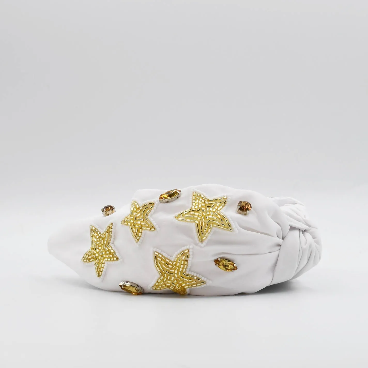 White/Gold Star Headband U42 sold by Charming Charlie