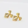 Twinkle Bow Gold sold by Charming Charlie