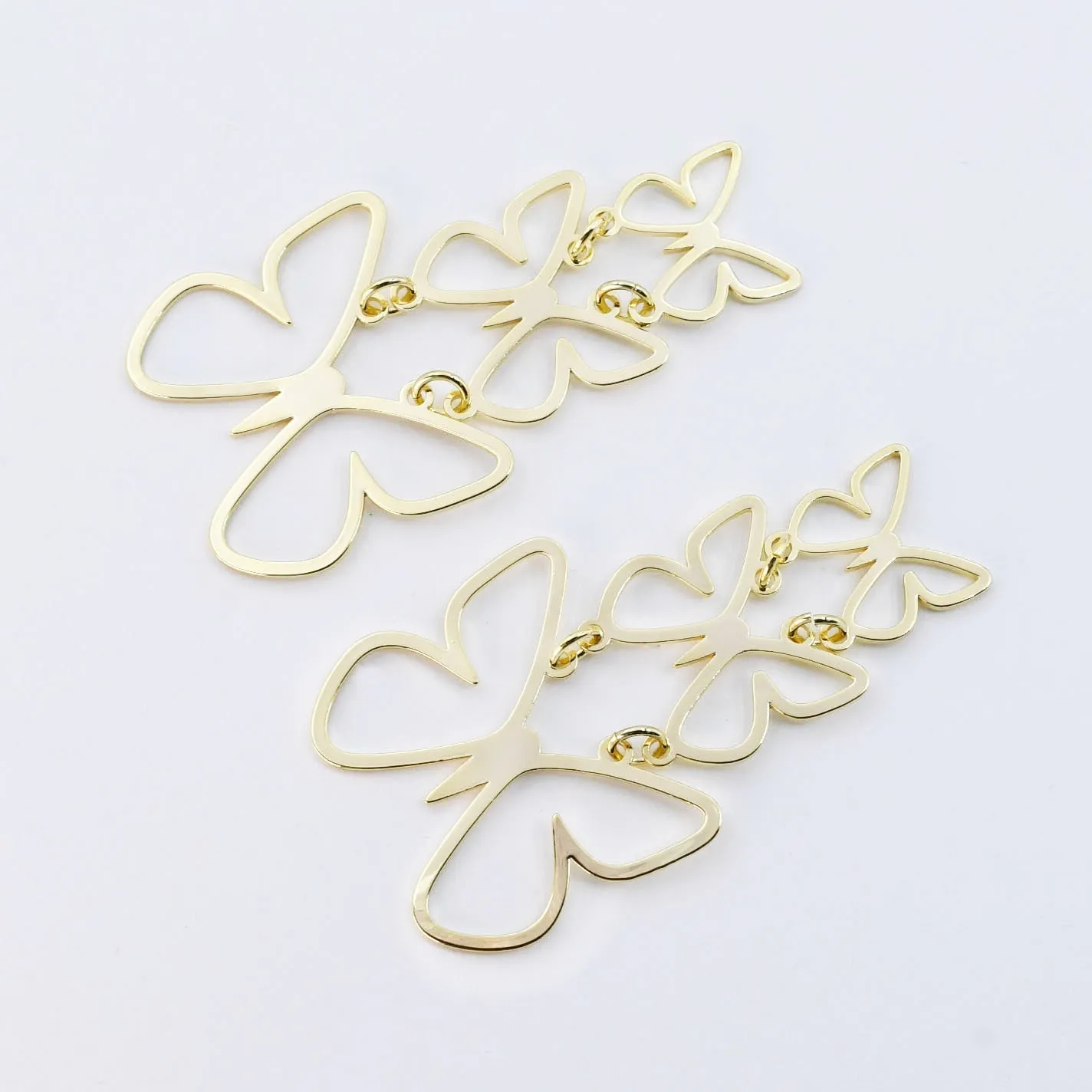 Triple Butterfly Gold sold by Charming Charlie