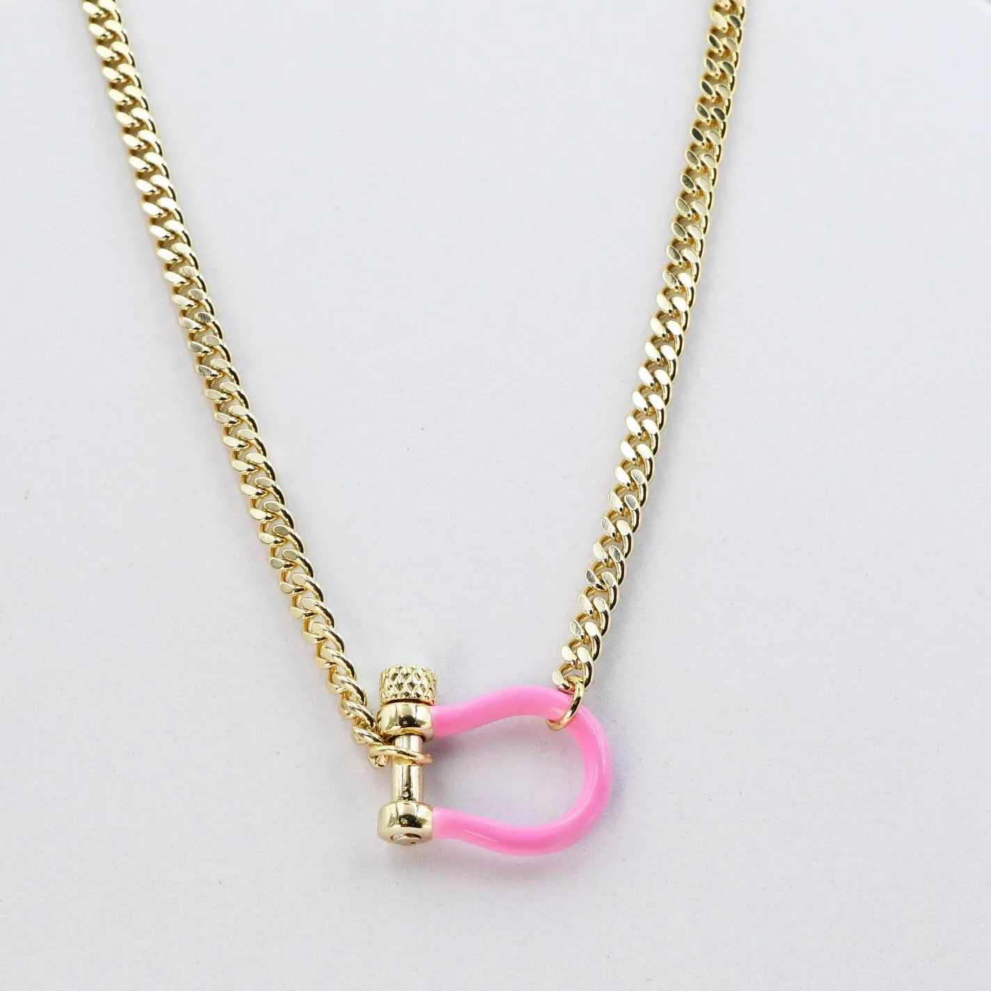 Pink Horseshoe L15 sold by Charming Charlie