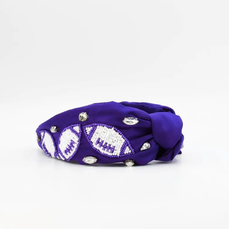 Purple/White Football Headband sold by Charming Charlie