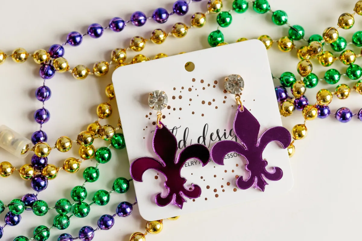 Gold and Purple Acrylic Party sold by Charming Charlie