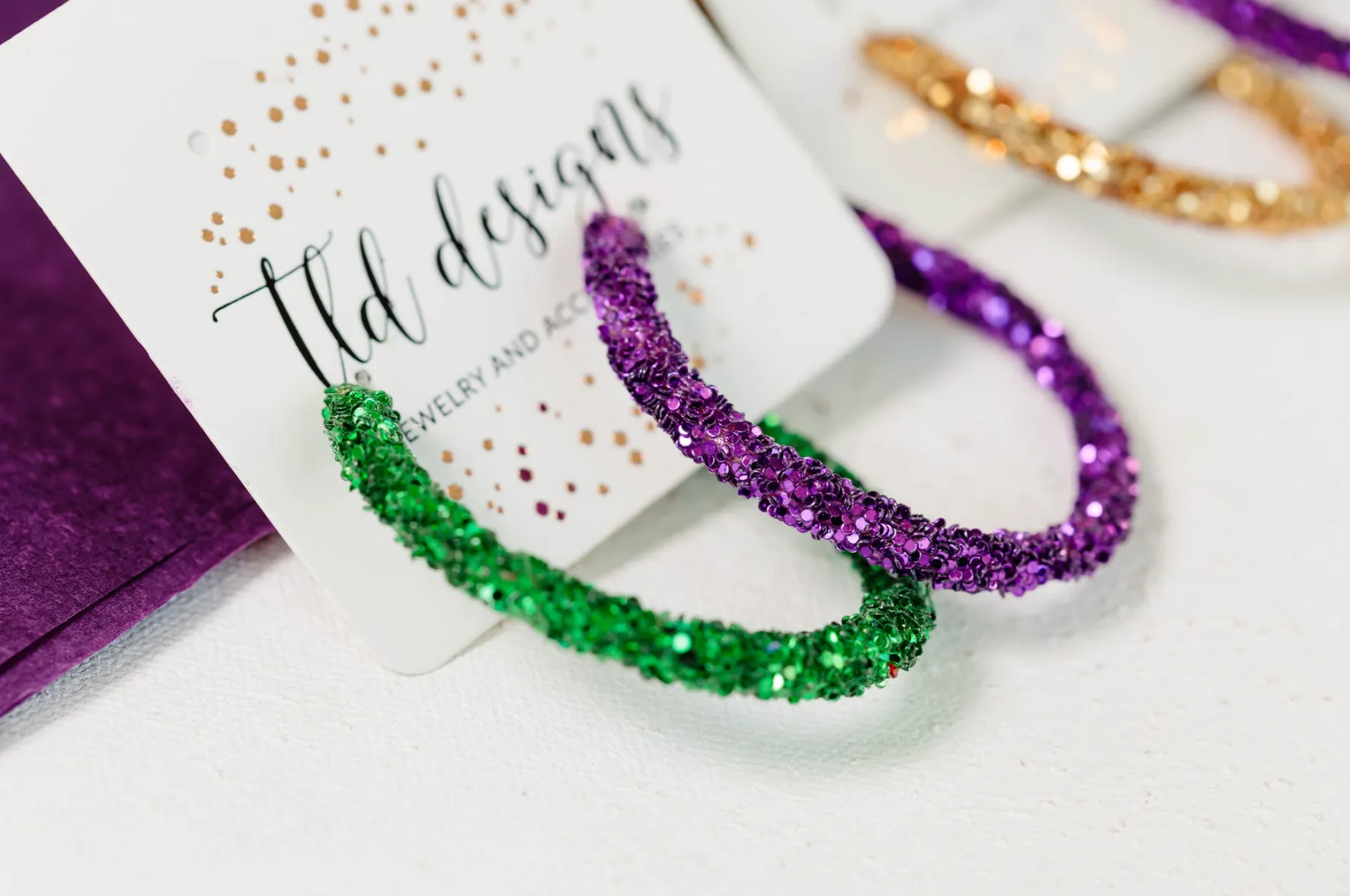 Mardi Gras Hoops sold by Charming Charlie product image thumbnail 3