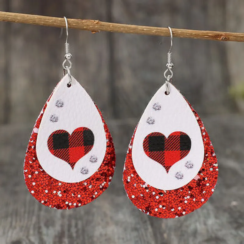 Heart Sequin Leather Teardrop Earrings sold by Charming Charlie